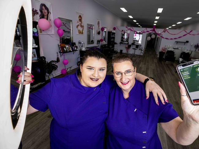 Jenna Gore and Tricia Howden at Warrnambool Art Gallery, one of 14 regional businesses trialling the vaccine passport technology. Picture: Nicole Cleary