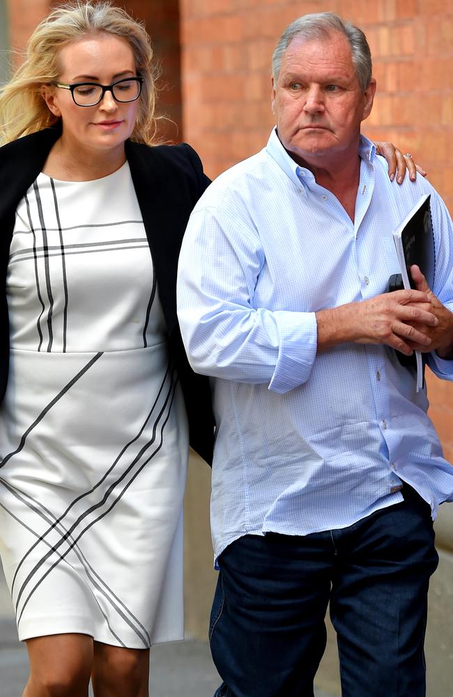 Emma Page-Campbell with her husband Robert Doyle in Flinders Lane on Thursday. Picture: Nicole Garmston