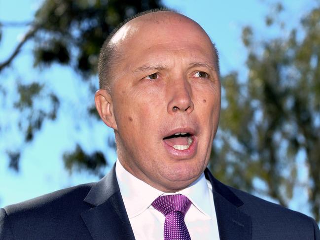 The Minister for Immigration and Border Protection Peter Dutton speaks at a press conference to announce the Dob in a Dealer campaign in Brisbane, Friday, July 13, 2018. (AAP Image/Bradley Kanaris) NO ARCHIVING
