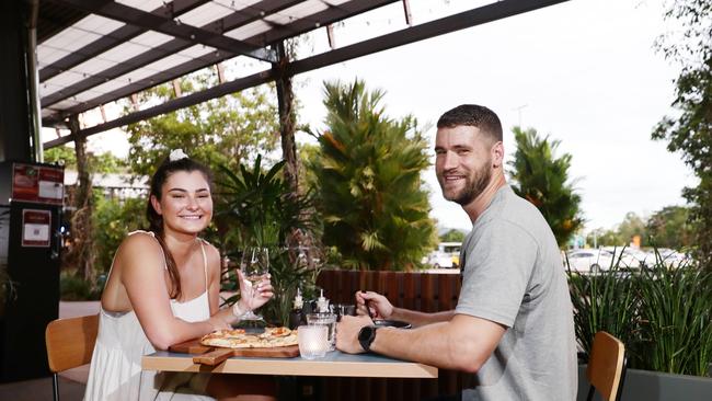 Layla Eady of Trinity Beach catches up with her friend Grant Coldstream of Earlville for a meal and a laugh at That Good Place Italian restaurant at Smithfield Shopping Centre. Picture: Brendan Radke