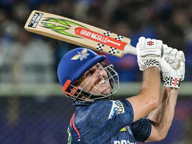 Lucknow Super Giants' Mitchell Marsh plays a shot during the Indian Premier League (IPL) Twenty20 cricket match between Delhi Capitals and Lucknow Super Giants at the Y.S. Rajasekhara Reddy cricket stadium in Visakhapatnam on March 24, 2025. (Photo by DIBYANGSHU SARKAR / AFP) / -- IMAGE RESTRICTED TO EDITORIAL USE - STRICTLY NO COMMERCIAL USE --