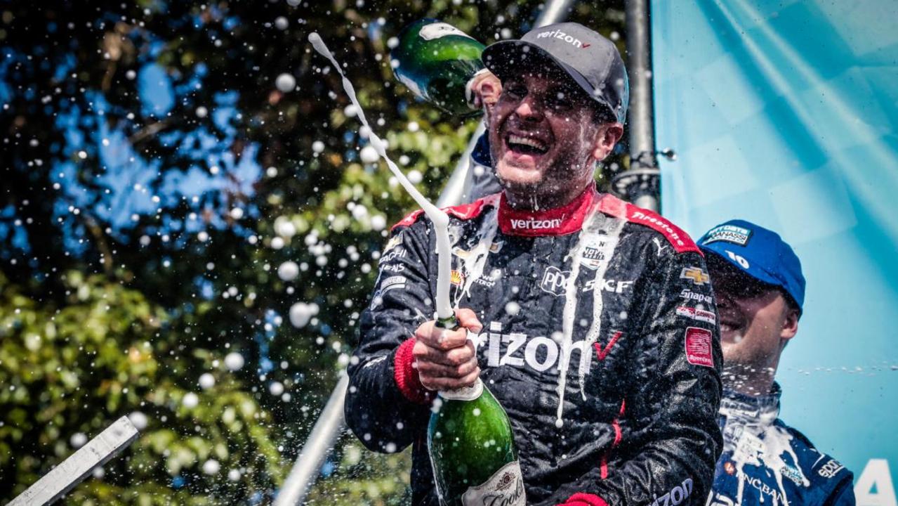 Power sprays champagne at Portland. Pic: IndyCar/Joe Skibinski