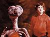 ET character and child actor Henry Thomas in a scene from the film E.T. the Extra-Terrestrial.