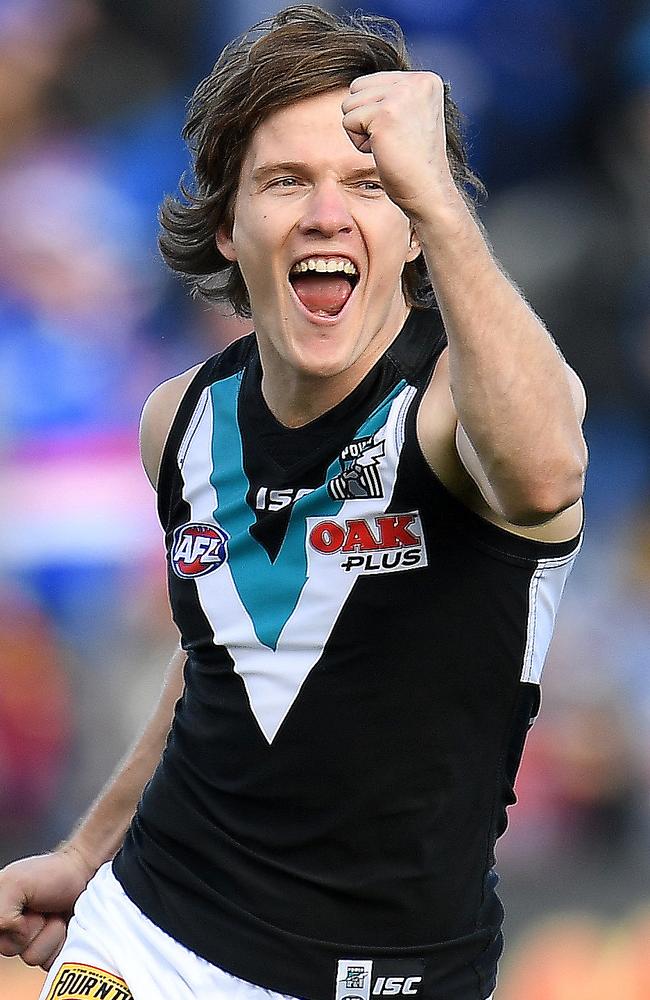 Jared Polec of the Power reacts after kicking a goal.