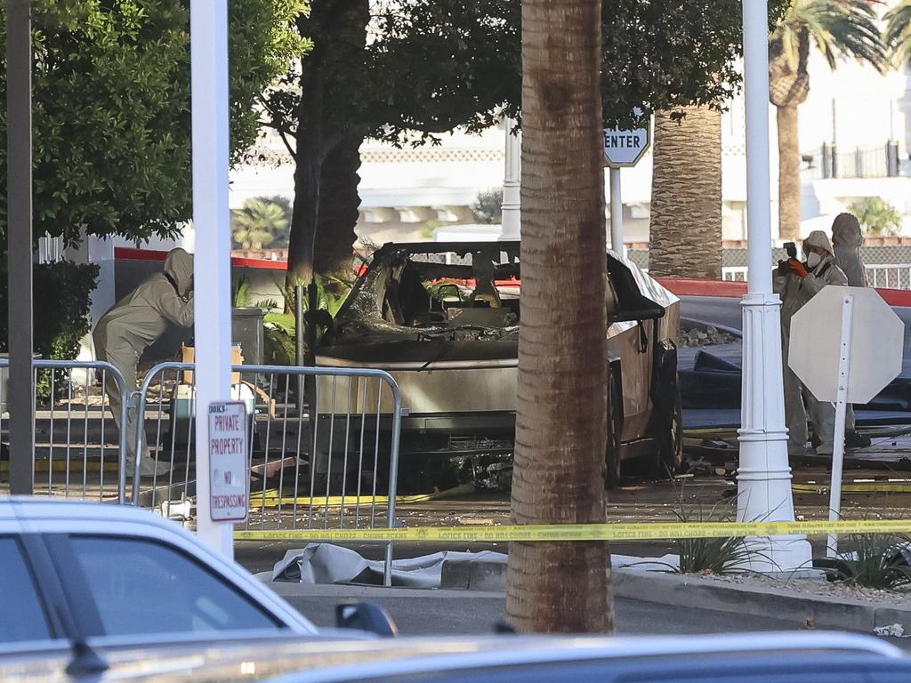 Investigators photograph a Tesla Cybertruck that exploded outside the lobby of President-elect Donald Trump's hotel. Picture: Wade Vandervort/AFP