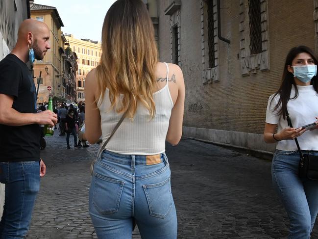 Young Italians gather for an aperitif in the Trastevere district of Rome following the easing of lockdown restrictions. Picture: AFP