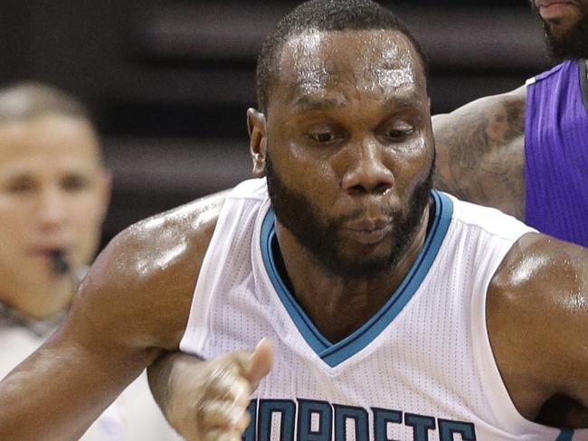 FILE - In this Nov. 23, 2015, file photo, Charlotte Hornets' Al Jefferson (25) drives against Sacramento Kings' DeMarcus Cousins (15) in the second half of an NBA basketball game in Charlotte, N.C. The NBA has announced that Charlotte Hornets center Al Jefferson has been suspended without pay for five games for violating the terms of the NBA/NBPA Anti-Drug Program. The Hornets released a statement Wednesday, Dec. 9, 2015, saying they’re “disappointed in Al’s decisions that led to this suspension” and the organization “does not condone this behavior.” (AP Photo/Chuck Burton, File)