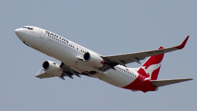 A Qantas plane departing from Brisbane Airport Picture: David Clark Photography