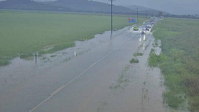 Vehicles driving on Shute Harbour Road at Hamilton Plains on Thursday morning.