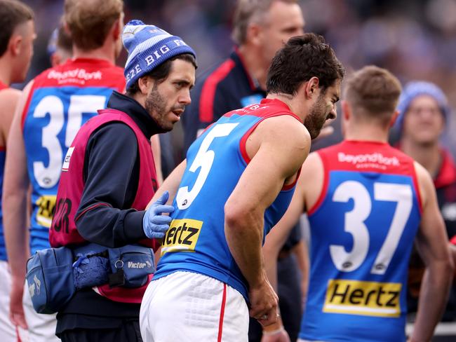 Christian Petracca of the Demons leaves the field injured at the first change. Picture: Jonathan DiMaggio/Getty Images.