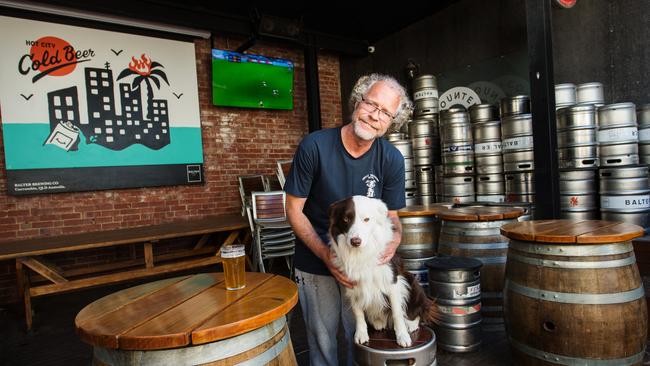 Alistair Carragher, with his dog Bozo, who owns the Great Northern Hotel in Carlton North. Picture: Paul Jeffers