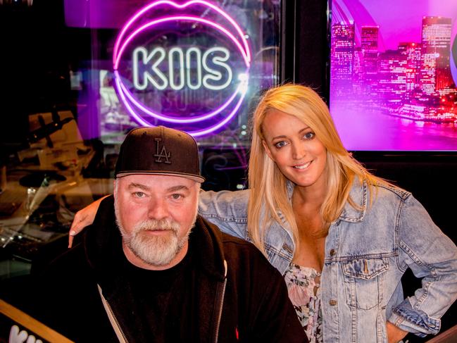 Kyle Sandilands and Jackie O with the missing neon sign nabbed by a “random”. Picture: Supplied