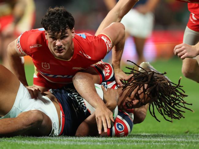 PERTH, AUSTRALIA - AUGUST 02: Herbie Farnworth of the Dolphins tackles Dominic Young of the Roosters during the round 22 NRL match between Dolphins and Sydney Roosters at HBF Park, on August 02, 2024, in Perth, Australia. (Photo by Janelle St Pierre/Getty Images)