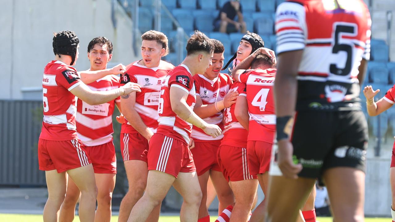 Palm Beach Currumbin players celebrate a try in their win over Kirwan SHS in the NRL Schoolboy Cup grand final at Bokarina. Picture Lachie Millard