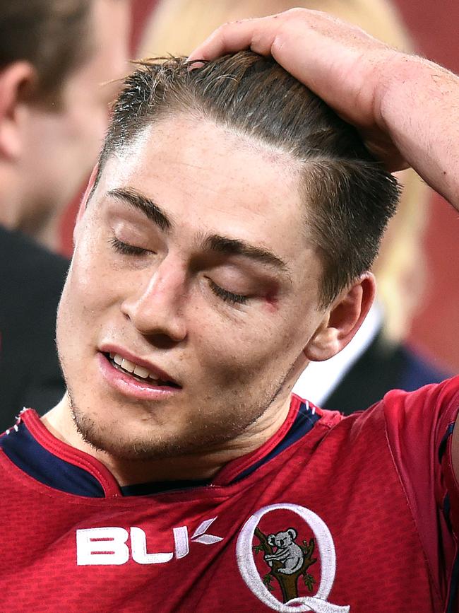 Reds player James O'Connor is dejected during the round 15 Super Rugby match between the Queensland Reds and the Sharks from South Africa at Suncorp Stadium in Brisbane, Friday, May 22, 2015. (AAP Image/Dave Hunt).