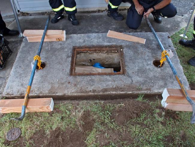 Police work to remove the lid of the septic tank containing the remains of Wayne Youngkin in North Road, Brighton in November 2016.