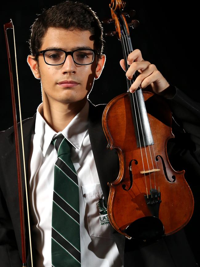 Aboud Kablo with his historic violin. Picture: Robert Pozo