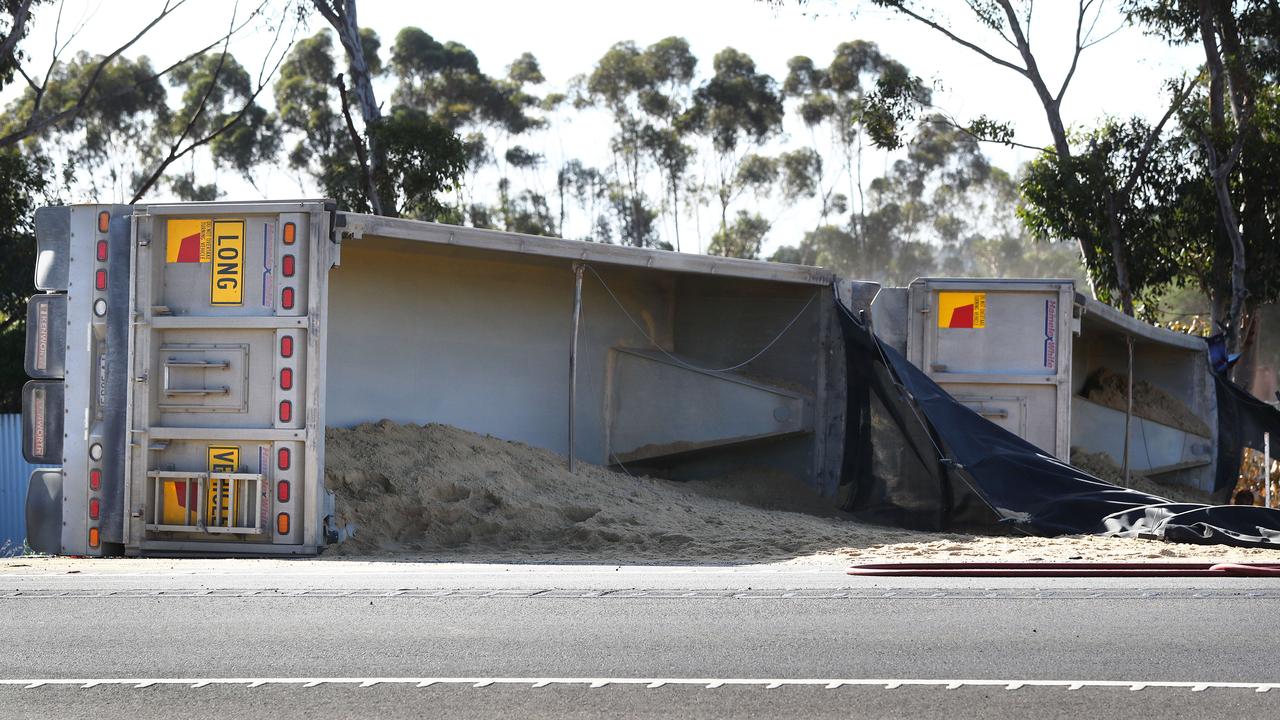 A sand truck overturned on Bacchus Marsh Rd. Picture: Alison Wynd