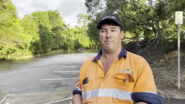 Cars submerged in floodwater on Sunshine Coast