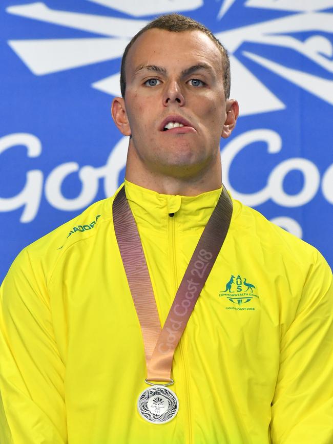 Kyle Chalmers receives his silver medal for the men’s 100m freestyle. Photo: AAP