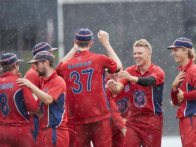 Melbourne celebrates a Carlton wicket.