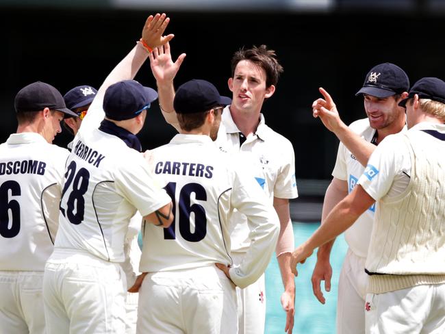 Louis Cameron is mobbed by Victorian teammates, many of whom he now reports on. Picture: Gregg Porteous. 