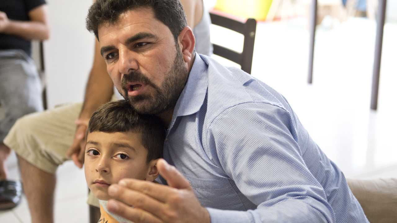 Raad Khairo and son Ammar, Yazidi refugees in Toowoomba. Picture: Neville Madsen