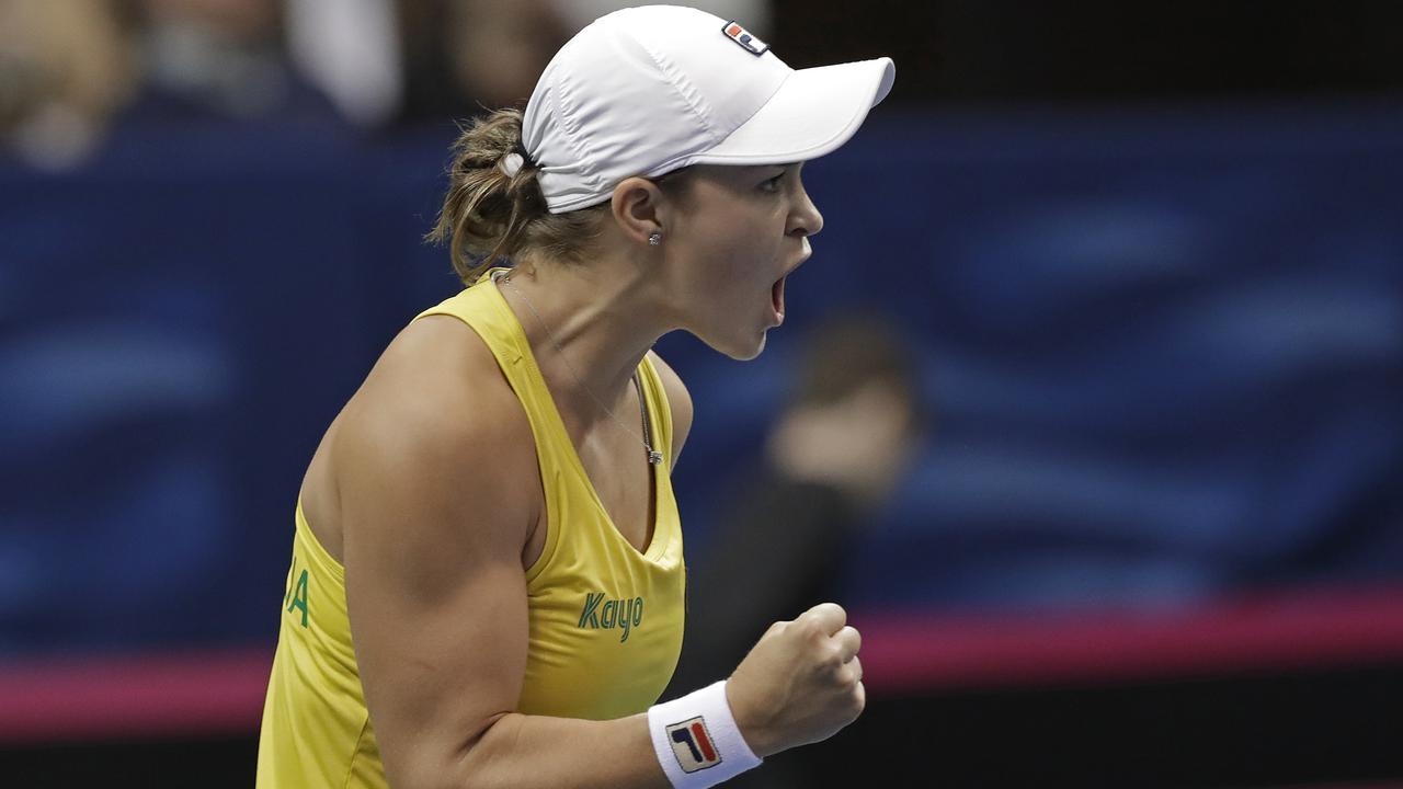 Australia's Ashleigh Barty reacts after defeating United States’ Sofia Kenin in their first-round Fed Cup tennis match. (AP Photo/Chuck Burton)