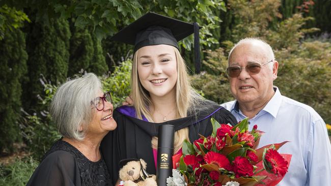 Bachelor of Laws graduate Brianna Wooller with her grandparents Dahlia and Frank Da Costa who timed their visit from Portugal to be there for Brianna's UniSQ graduation ceremony at Empire Theatres, Wednesday, February 14, 2024. Picture: Kevin Farmer