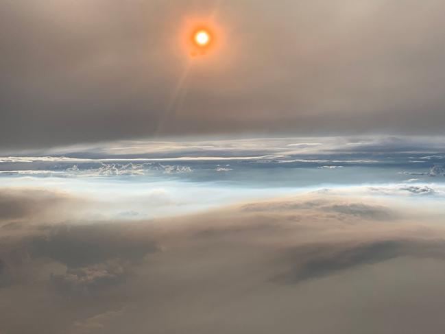 At 30,000 feet, smoke from a fire-induced thunderstorm stretched from horizon to horizon during the Williams Flats fire (Washington state), on Aug. 8, 2019. This photo was taken from the cockpit of NASA’s DC-8 Flying Laboratory. DAVID PETERSON/FIREX-AQ