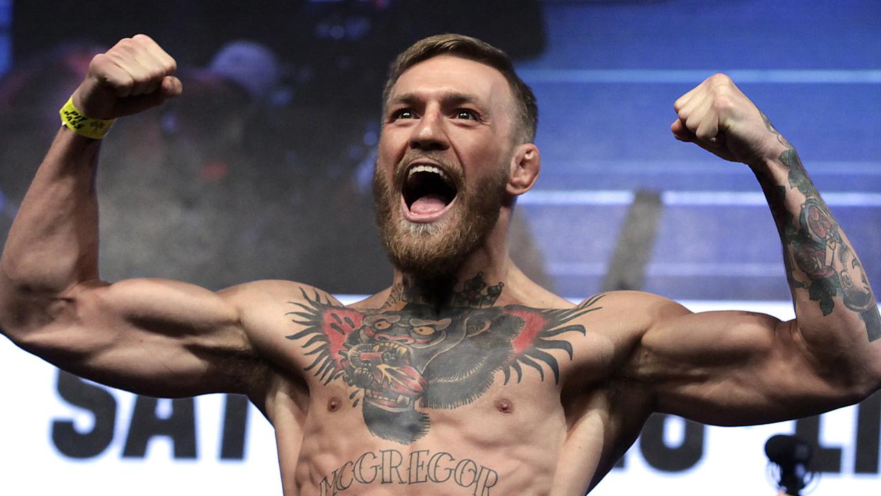 Conor McGregor is back. (Photo by John GURZINSKI / AFP)