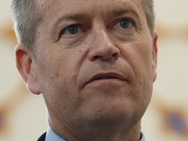 Federal Leader of the Opposition Bill Shorten looks on during a visit to the Lakemba Mosque, in south west Sydney, Saturday, Oct. 31, 2015. Mr Shorten, along with other political figures and community leaders such as Treasurer Scott Morrison, Labor MP's Jason Clare and Tony Burke, and NSW Deputy Police Commissioner Catherine Burn, paid a visit to the mosque during National Mosque Open Day. (AAP Image/Dan Himbrechts) NO ARCHIVING