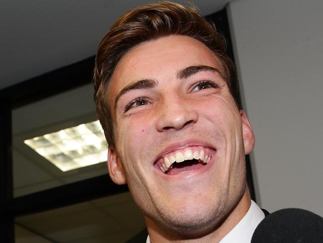 A happy Jack Viney leaves the appeal hearing at AFL House. May 8th 2014. Picture : Colleen Petch.