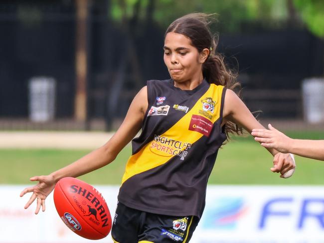 Deontae Greenoff kicks clear in Round 8 of the Women's Premier League season. Picture: Celina Whan / AFLNT Media.