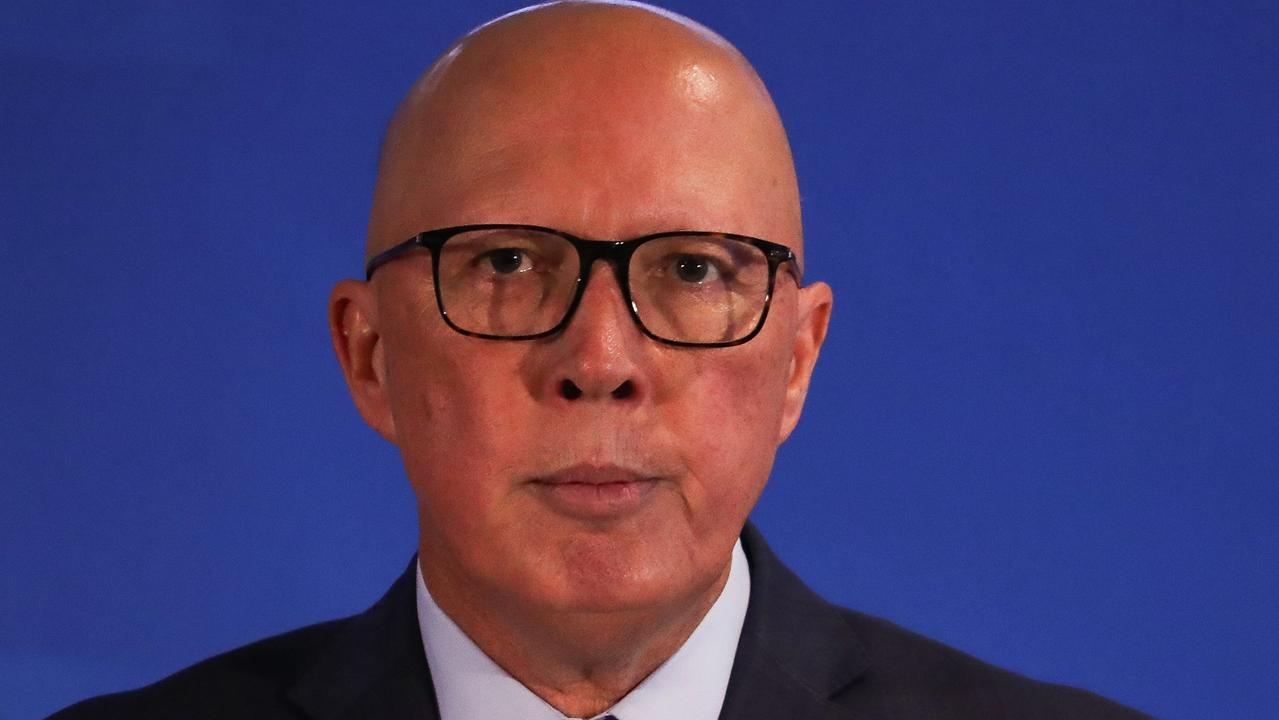 Dutton hits back at lunch scheme dig