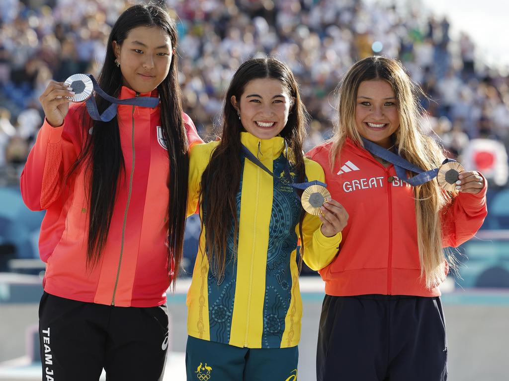 Women’s skate park gold medallist, Australia’s Arisa Trew, centre, with Japan’s silver medallist Corona Hiram, left, and bronze medallist Sky Brown of Team Great Britain. Picture: Michael Klein