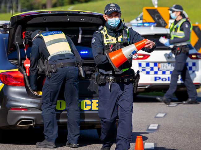 Victoria Police conduct checks at Albert Park during a Covid-19 stage three lockdown in Melbourne, Victoria. Picture: Mark Stewart