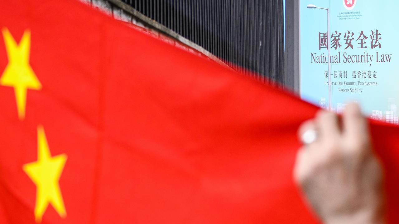 A billboard referring to the much criticised national security law in Hong Kong. Picture: Anthony Wallace/AFP