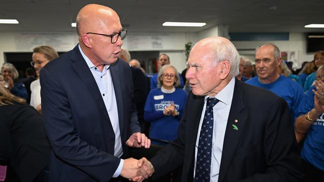 Peter Dutton with former Liberal prime minister John Howard in the final week of the campaign. Picture: Getty Images