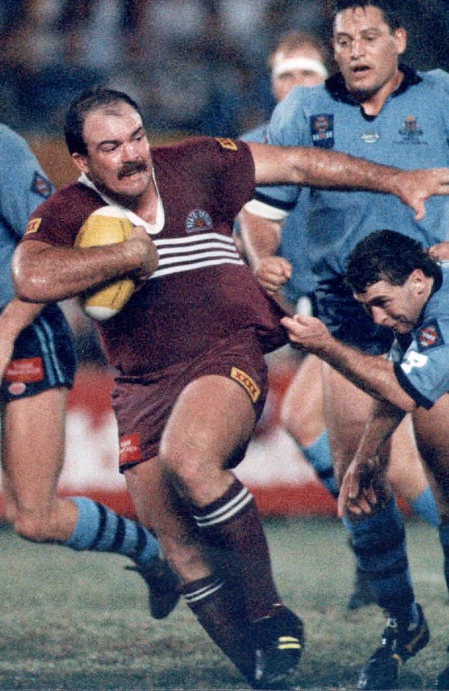 1991 game two of the rugby league State of Origin series, 1991, Queensland vs New South Wales at Sydney Football Stadium. NSW won 14-12 to level the series but Queensland won the third-game decider. All three matches were decided by two-point margins. Queensland's Martin Bella is tackled by David Gillespie. Picture: Rugby League A/CT