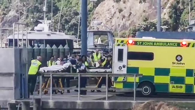 An injured person is taken to hospital. Picture: NZ Herald