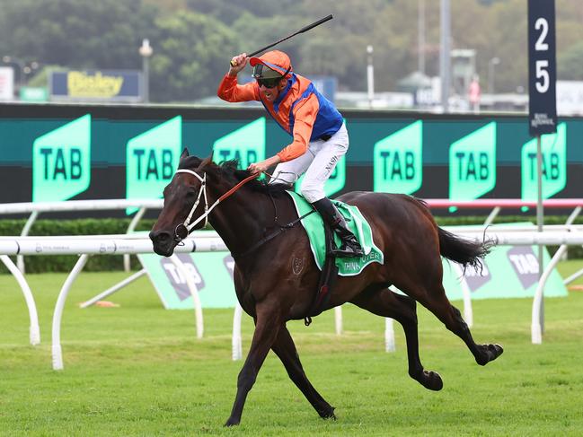 SYDNEY, AUSTRALIA - MARCH 02: Nash Rawiller riding Think It Over  wins Race 7 Verry Elleegant Stakes during TAB Verry Elleegant Stakes Day - Sydney Racing at Royal Randwick Racecourse on March 02, 2024 in Sydney, Australia. (Photo by Jeremy Ng/Getty Images)