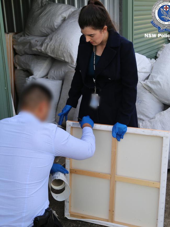 Police seize items at a storage facility in Appin. Picture: NSW Police