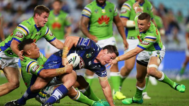 SYDNEY, AUSTRALIA — APRIL 29: Josh Jackson of the Bulldogs is tackled just short of the line during the round nine NRL match between the Canterbury Bulldogs and the Canberra Raiders at ANZ Stadium on April 29, 2017 in Sydney, Australia. (Photo by Matt King/Getty Images)