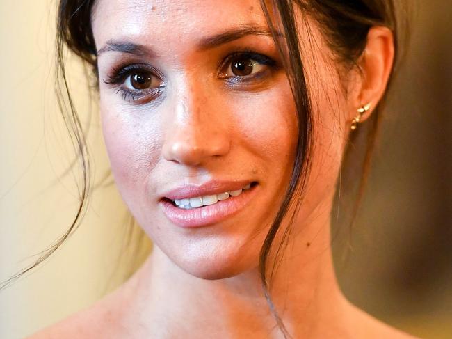 CARDIFF, WALES - JANUARY 18:  Meghan Markle chats with people inside the Drawing Room during a visit to Cardiff Castle on January 18, 2018 in Cardiff, Wales. (Photo by Ben Birchall - WPA Pool / Getty Images)