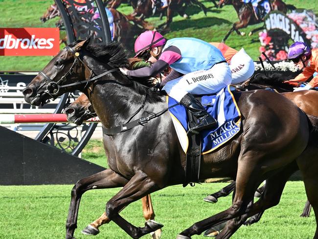 Luke Dempsey storms home aboard Give Me Space to win the Group 3 Vo Rogue Plate at Eagle Farm. Picture: Grant Peters - Trackside Photography.