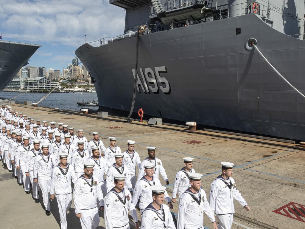 HMAS Supply ship’s company march at the commencement of her commissioning ceremony at Fleet Base East in Sydney.