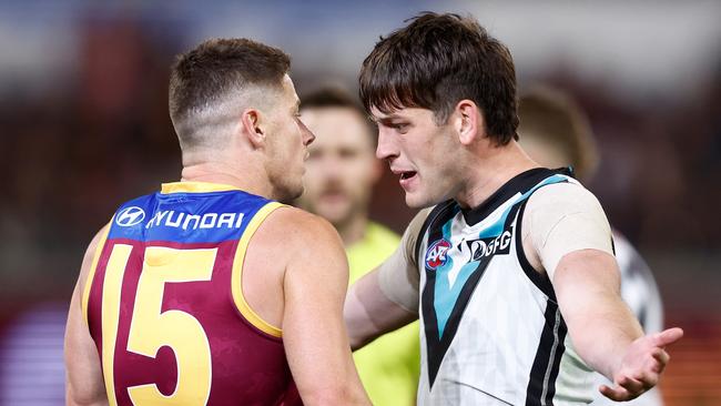 Dayne Zorko and Zak Butters square off. Picture: Michael Willson/AFL Photos