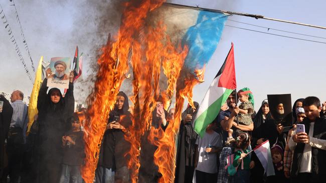 Iranians burn an Israeli flag during a rally in Tehran on October 2. Picture: AFP