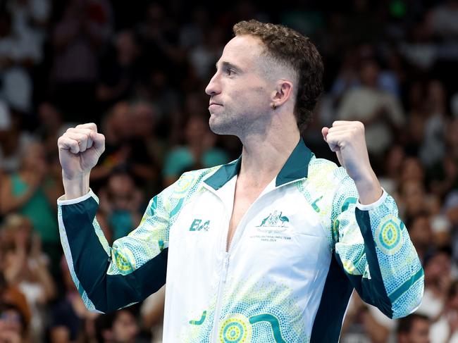 NANTERRE, FRANCE - AUGUST 29: Gold Medallist Thomas Gallagher of Team Australia celebrates on the podium during the medal ceremony for the Men's 50m Freestyle S10 Final on day one of the Paris 2024 Summer Paralympic Games at Paris La Defense Arena on August 29, 2024 in Nanterre, France. (Photo by Michael Reaves/Getty Images)